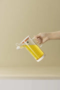 Anti-drip glass oil dispenser bottle with secure pouring spout