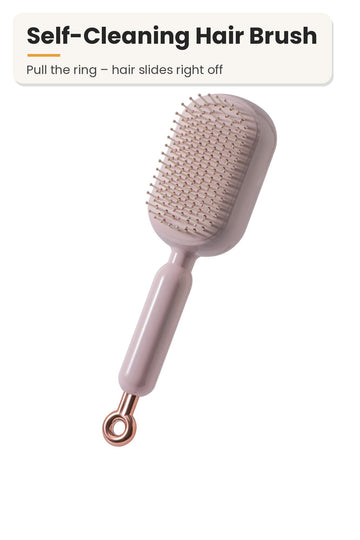 La Basera pink self-cleaning hair brush with retractable bristles