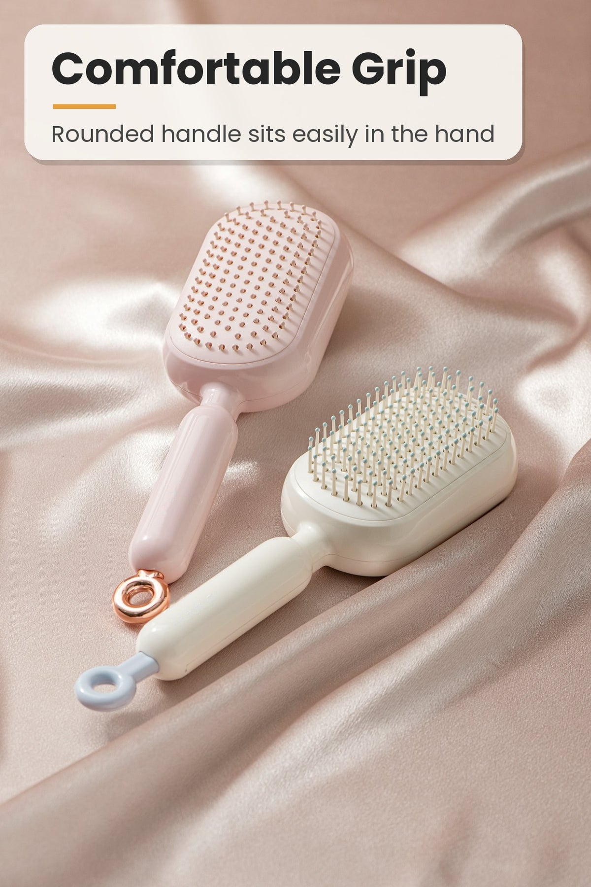 Self-cleaning hair brush with comfortable rounded handle