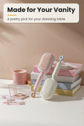 Self-cleaning hair brush on a vanity table