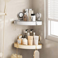 La Basera suction cup corner shelf in gray and cream mounted in a bathroom