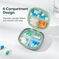 La Basera green pill box organizer with separate compartments and flip lids